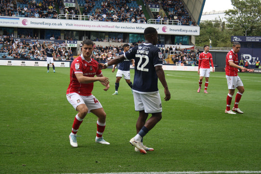 Wrexham players in action against Millwall, 30 August 2025