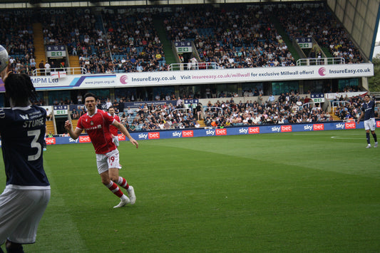 Wrexham AFC player in action against Millwall, 30 August 2025